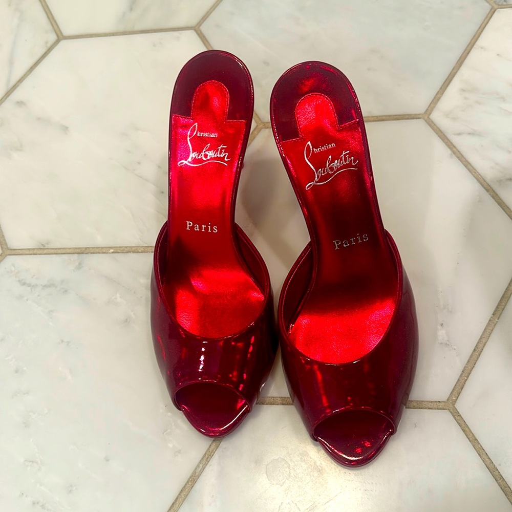 Christian Louboutin patent red peep toes worn twice.